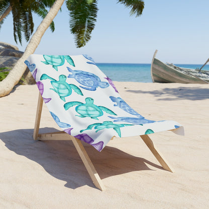 Ocean-themed beach towel with playful turtle pattern