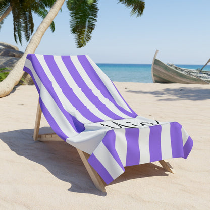 Personalized striped beach towel with custom name for bridesmaids.