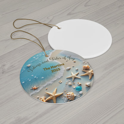 Decorative ornament with beach scene and personalized text on a wooden surface