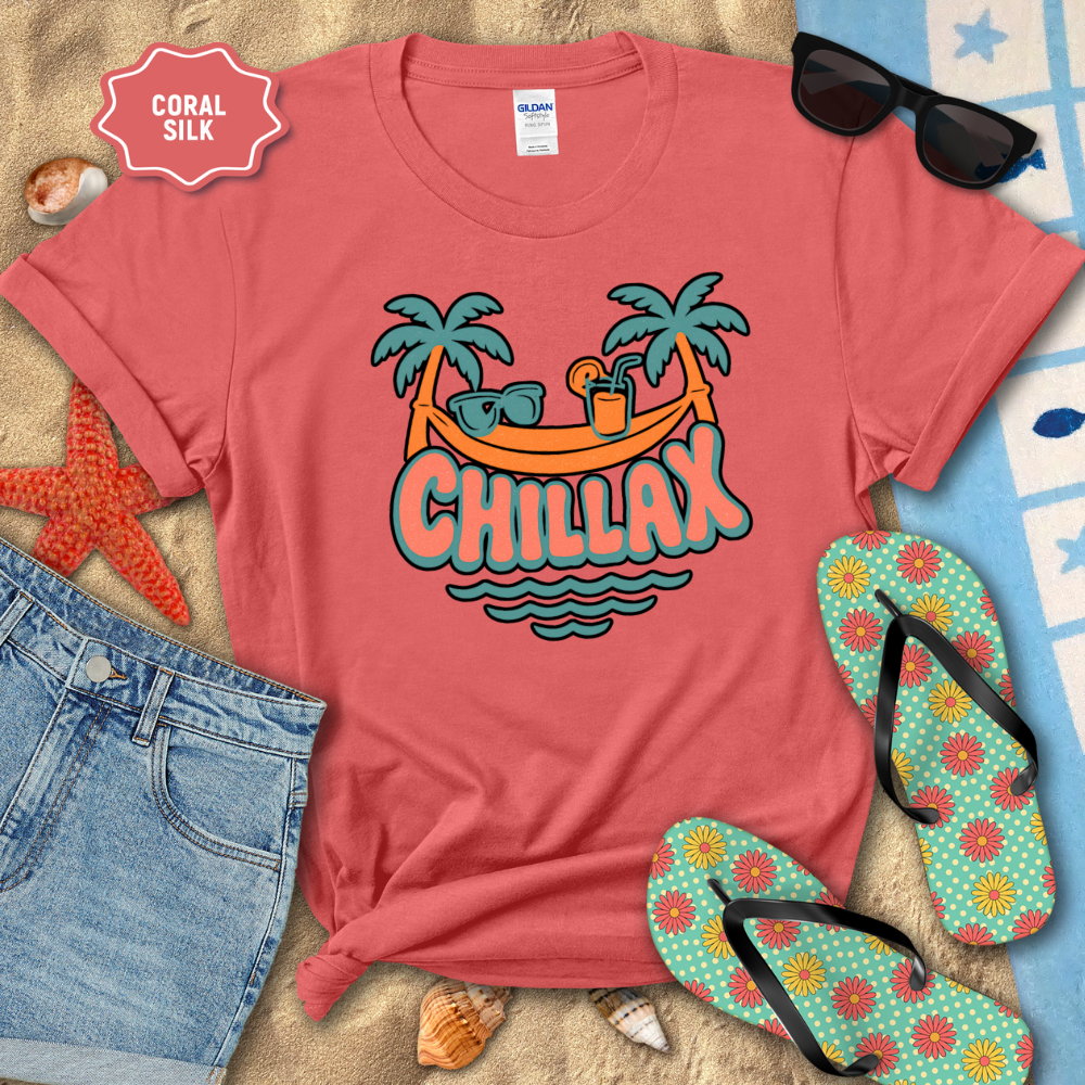 Coral t-shirt with 'Chillax' design on a beach-themed background with sunglasses, flip-flops, and starfish.