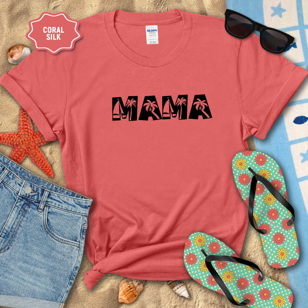 Coral t-shirt with 'MAMA' print on a beach-themed background with sunglasses, flip-flops, and denim shorts.