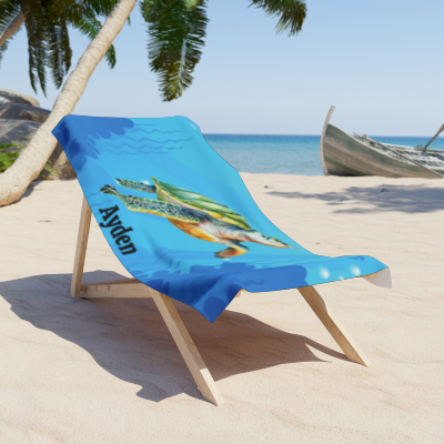 Custom name towel featuring a cartoon sea turtle underwater

