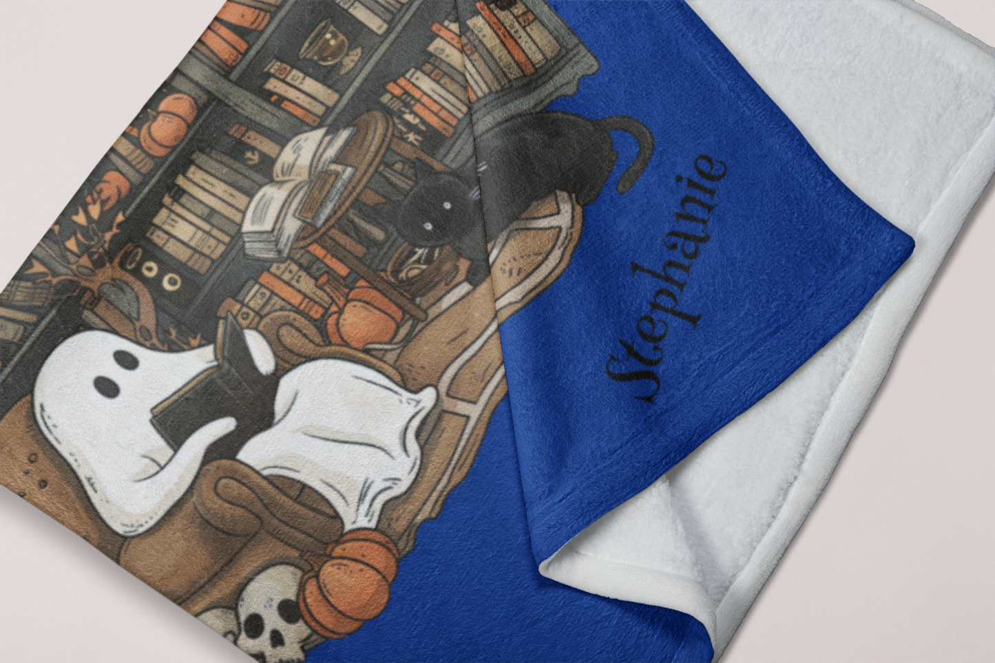 Personalized blanket with ghost and book design, featuring the name 'Stephanie'.