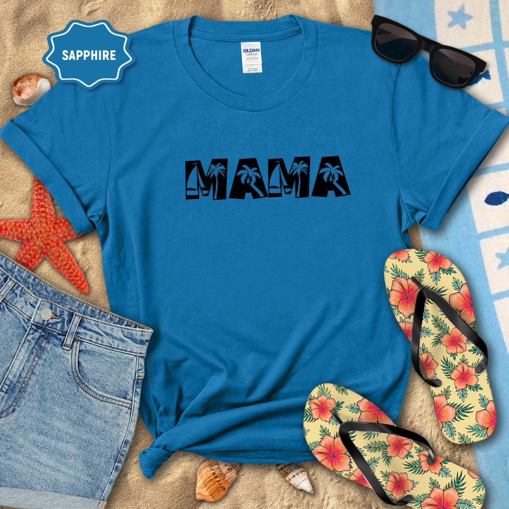 Blue t-shirt with 'MAMA' text on a beach setting with sunglasses, flip-flops, and denim shorts.