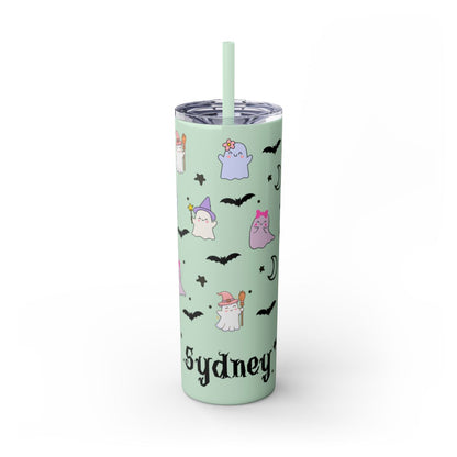 Tumbler with Halloween-themed design and straw on a white background
