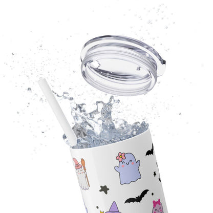 Tumbler with Halloween-themed design and straw on a white background