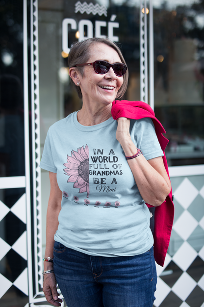 Custom baby blue grandma shirt with floral design and names of grandchildren