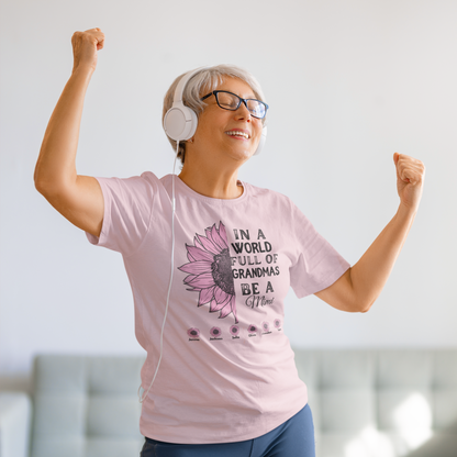 Dancing Woman with headphones wearing personalized “Be a Mimi” t-shirt with pink sunflower and grandkids’ names