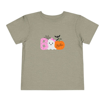 Children's t-shirt with Halloween-themed design on a beige background