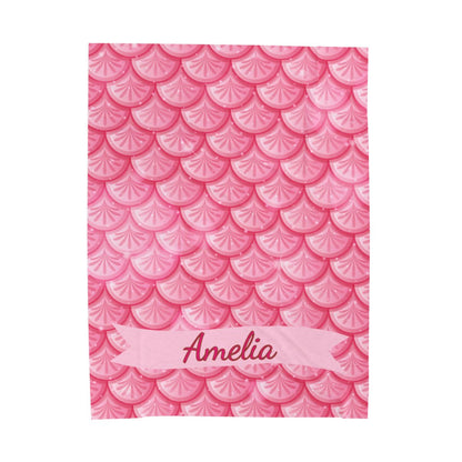 Notebook with pink fish scale pattern and 'Amelia' on a white background